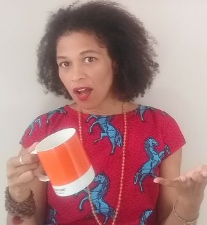 Cloudia with orange cup